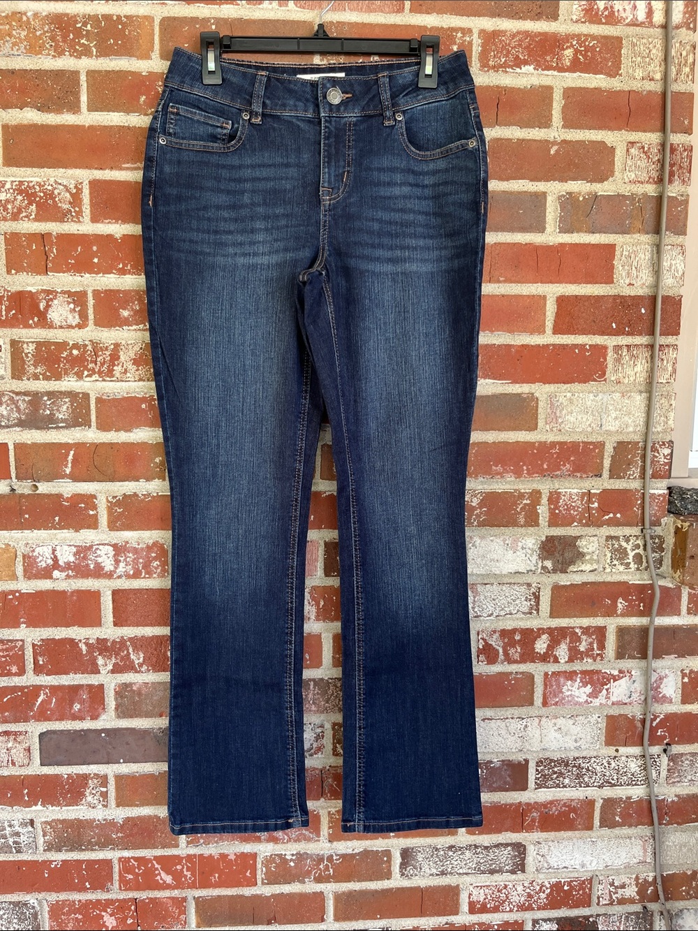 jeans by maurices™ Classic Slim Boot Mid Rise Jeans in a dark wash. Size 6